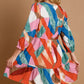 Umgee Abstract V-Neck Tiered Printed Dress - DAVERRI FASHIONS