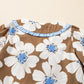 Brown floral print blouse with striped tie sleeves and ruffled neckline