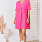 Zenana Swiss Dot Rolled Short Sleeve Babydoll Dress Red-Violet Babydoll Dresses