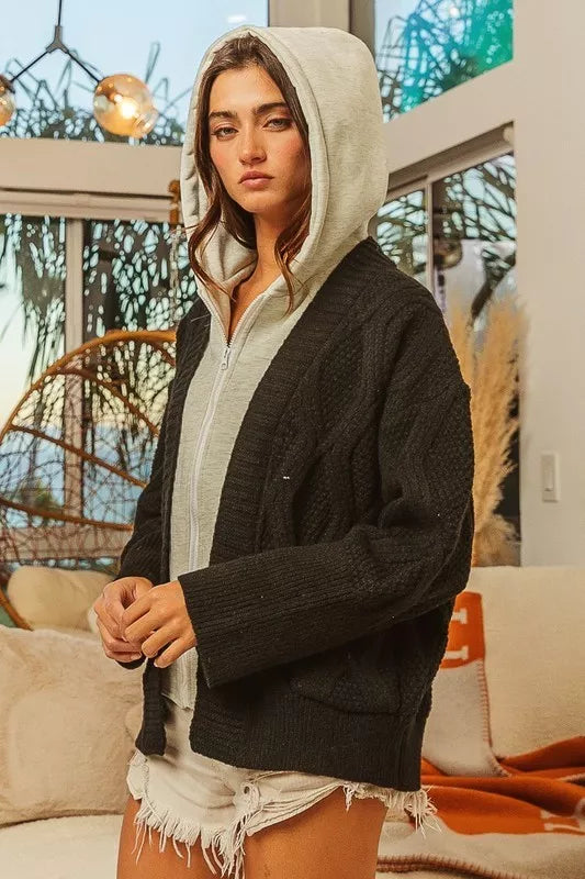 Black cable-knit BiBi Knit Hoodie Rhombus Sweater Jacket over gray hoodie