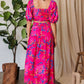 Vibrant pink Davi & Dani floral maxi dress with puffy sleeves