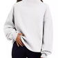 White oversized mock neck sweatshirt with ribbed cuffs