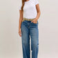 Blue Judy Blue flare jeans with tan belt and corduroy waist