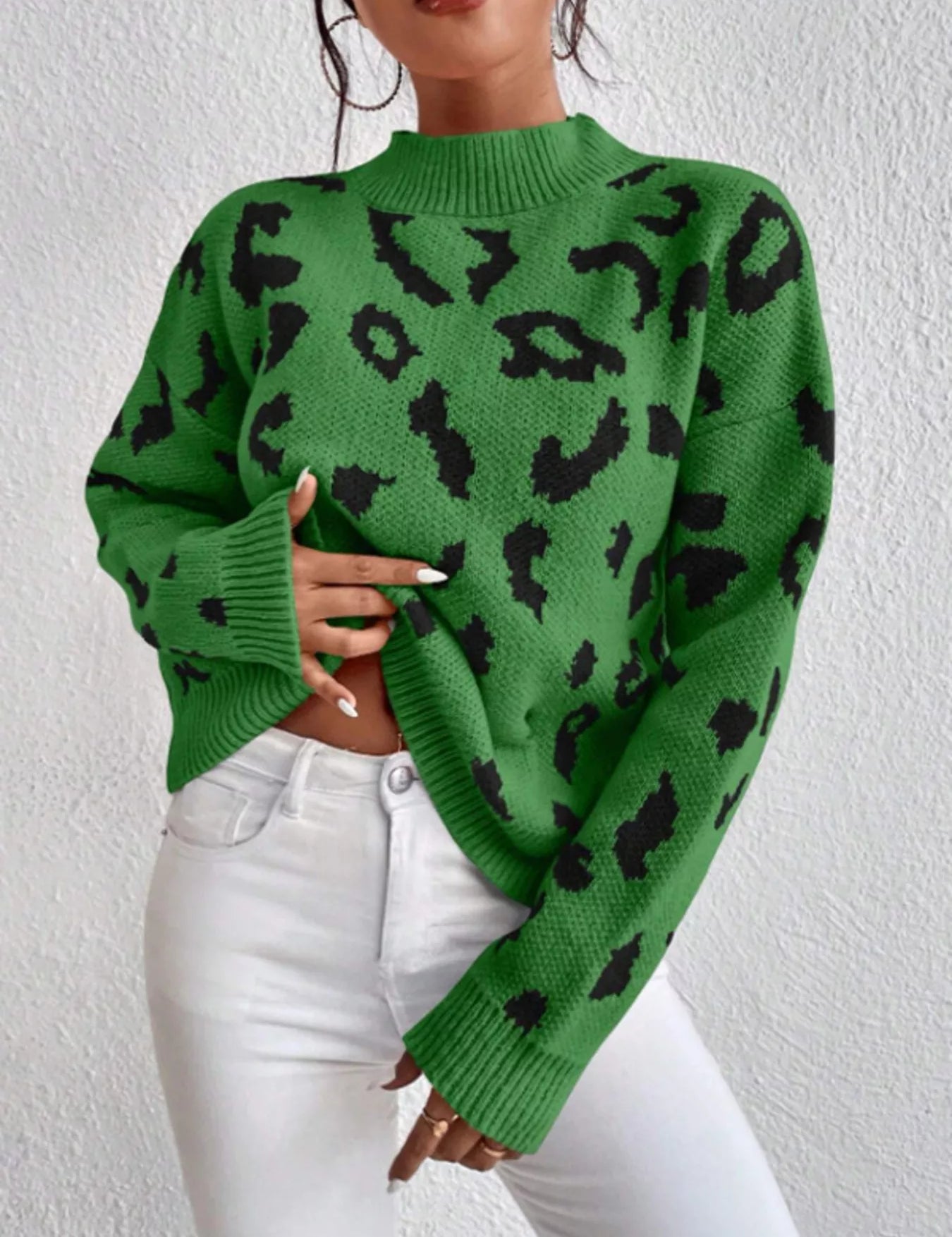 Green Leopard Mock Neck Sweater with White Jeans and Black Nail Polish
