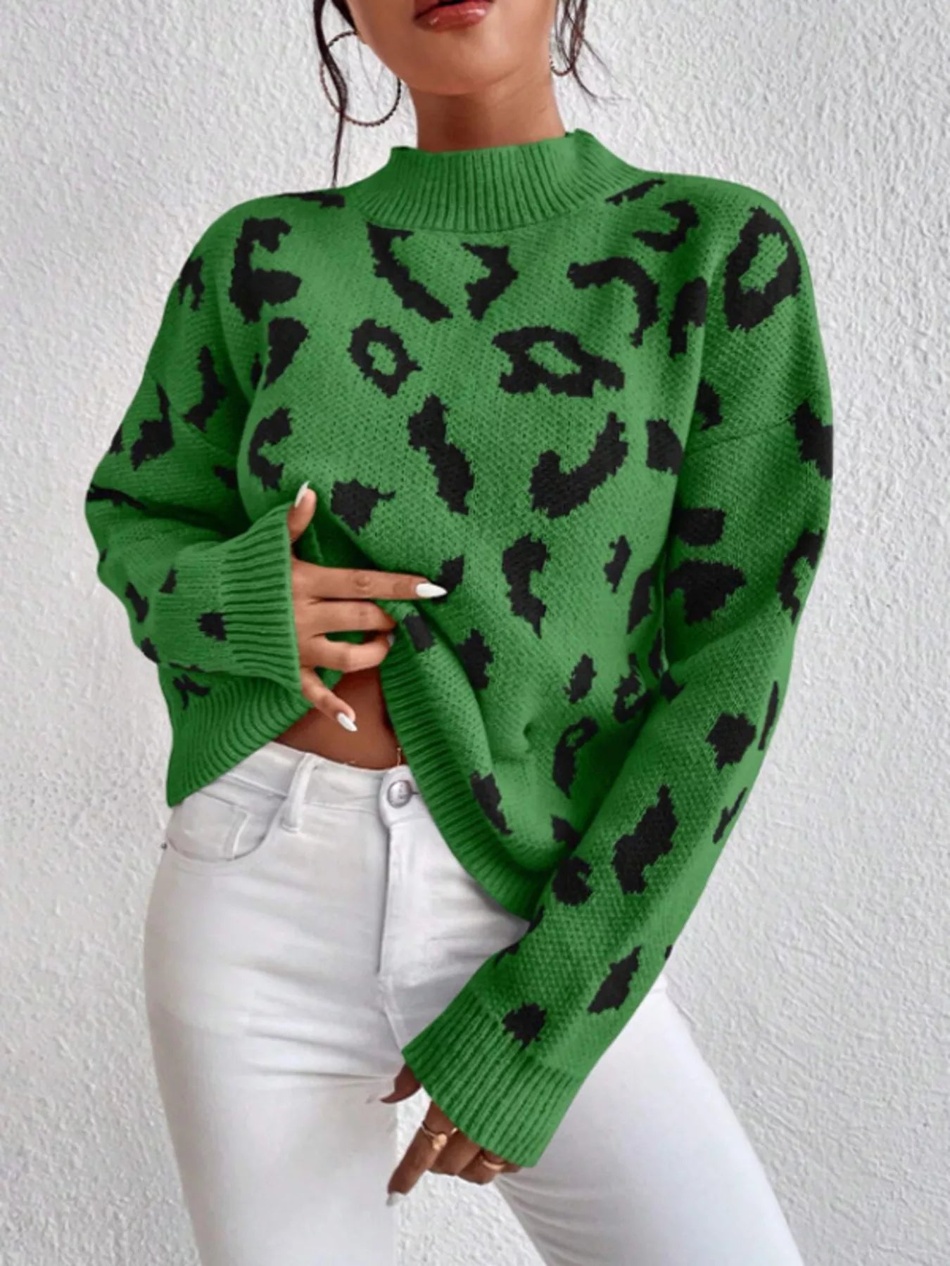 Green Leopard Mock Neck Sweater with White Jeans and Black Nail Polish