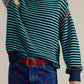 Teal and navy striped knit sweater with red trim