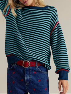 Teal and navy striped knit sweater with red trim