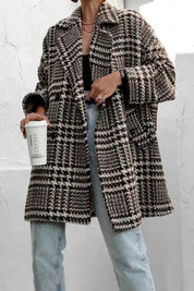 Houndstooth wool coat with black white checkered pattern and pockets