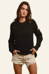 BiBi Twist black knitted open shoulder sweater with cut-outs
