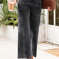 High-waisted wide-leg washed jeans in dark gray with faded wash and rolled cuffs