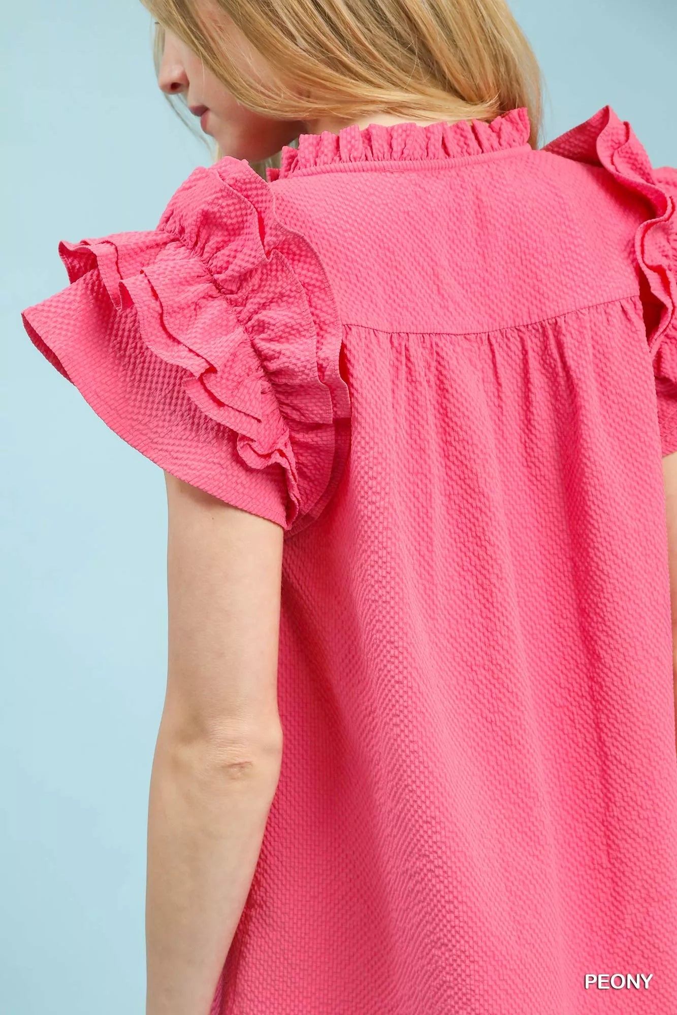 Vibrant pink Umgee textured ruffle sleeve notched top with ruffles