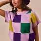 Vibrant SO ME Mardi Gras plaid sweater in lavender, purple, green, yellow knit