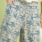 Umgee linen printed wide leg raw hem pants in beige with blue botanical print