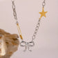 Two-Tone Stainless Steel Bow Star Necklace - DAVERRI FASHIONS