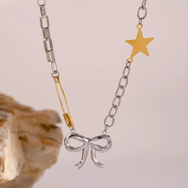 Two-Tone Stainless Steel Bow Star Necklace | Necklaces Daverri Fashions