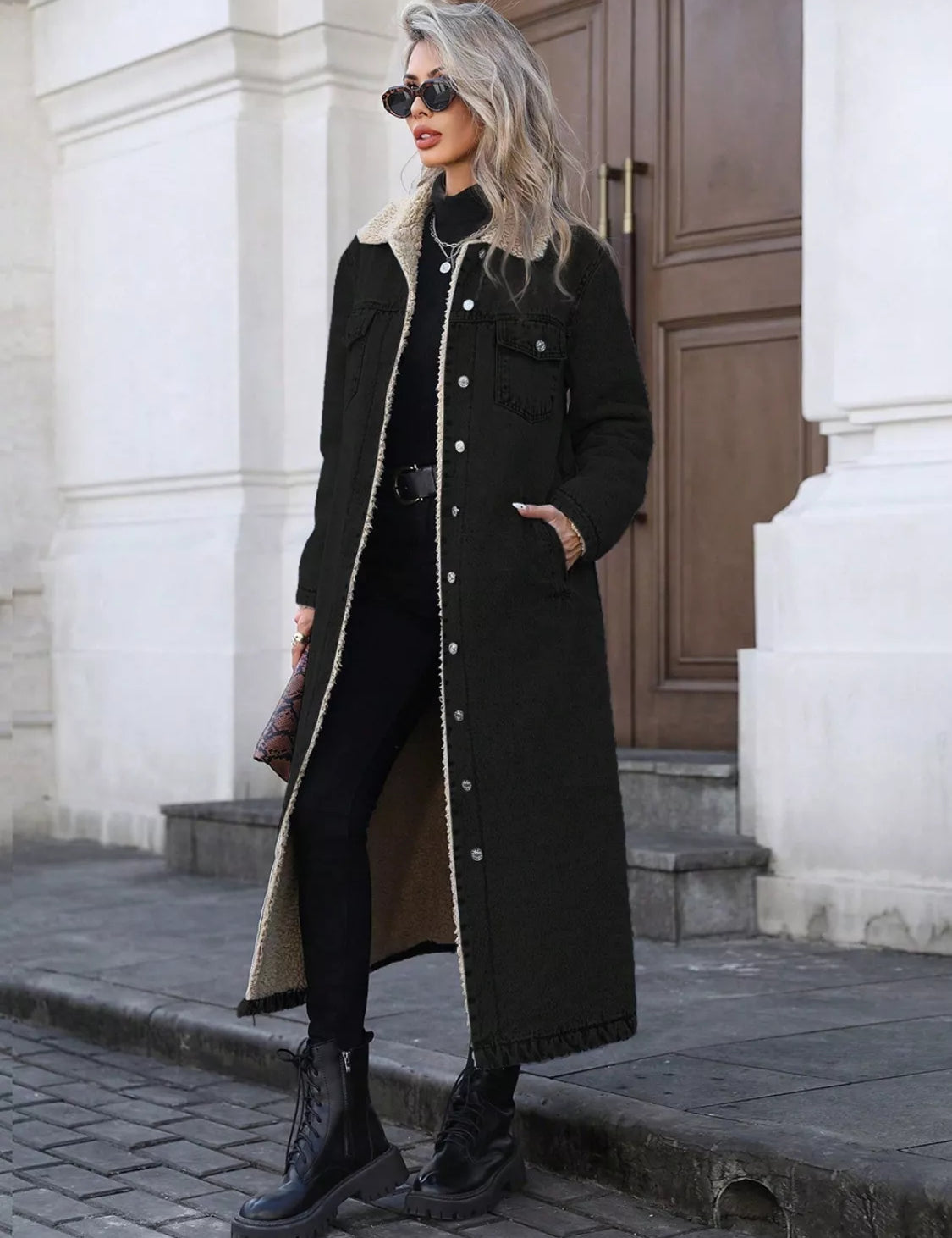 Sherpa lined black longline coat with buttons and slits