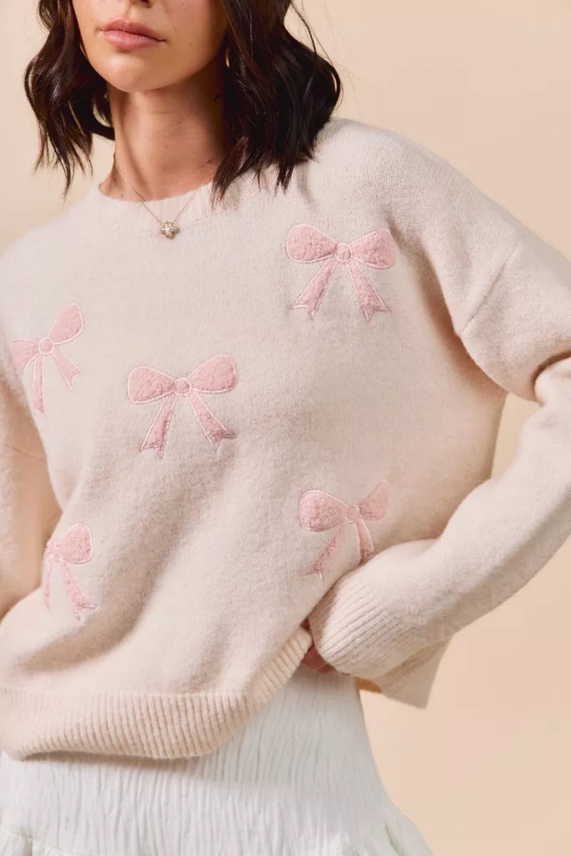 SO ME cream knit sweater with pink embroidered bows