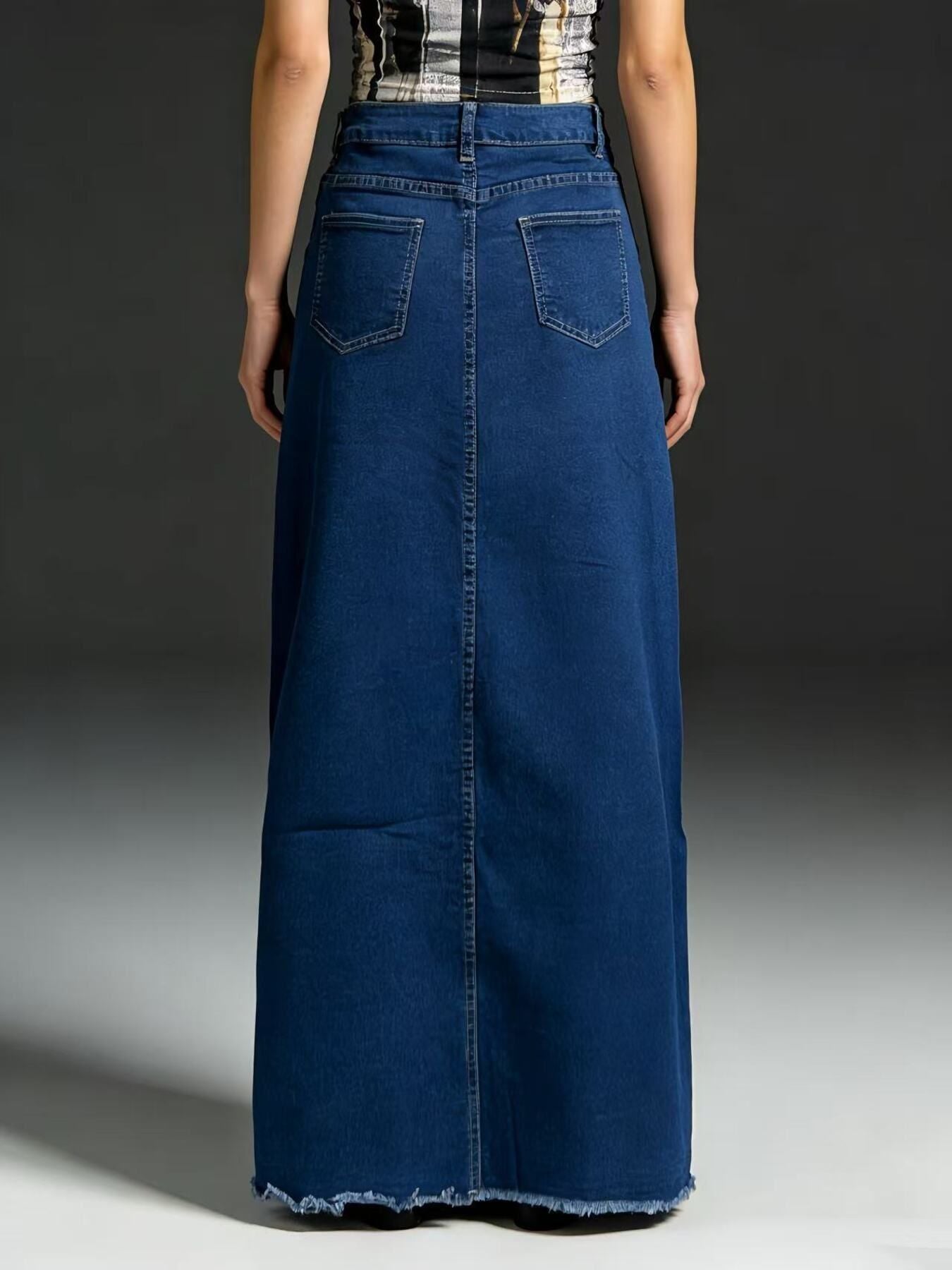 Raw hem maxi denim skirt back view with deep blue denim, straight cut, pockets, frayed hem