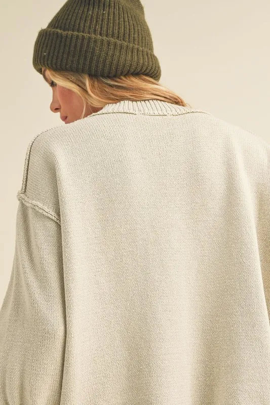 Aemi+Co Ribbed Hem Exposed Seam Round Neck Sweater