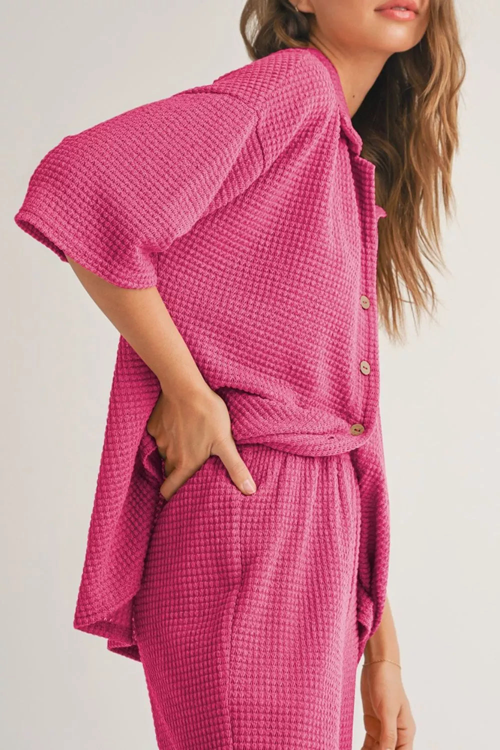 Vibrant pink waffle-knit button-up shirt in casual set