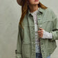 Vintage washed olive green denim shacket with button closures and lace cuffs