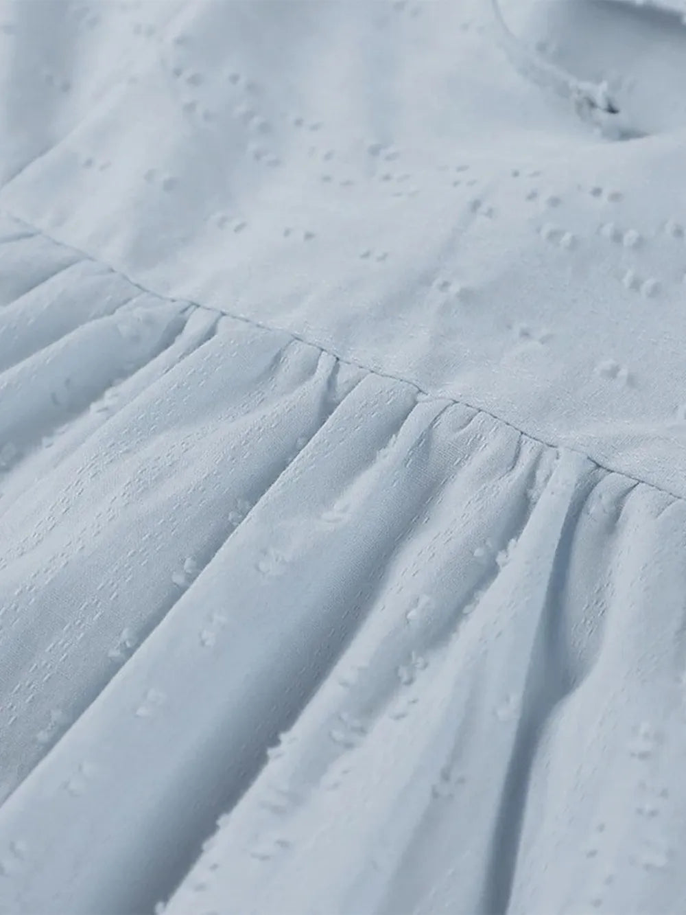 Full size tied three-quarter sleeve mini dress in light blue with eyelet embroidery