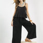 Black ruffled camisole top with scalloped edges on Umgee pants