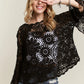 Adora Bell Sleeve Crochet Top in black lace with floral patterns