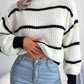 Cozy black and white striped plus size mock neck knit sweater