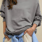 Side Slit Round Neck Long Sleeve Sweatshirt - DAVERRI FASHIONS