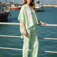 Mint green Daverri openwork tassel gradient knit poncho cover up