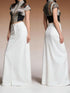 White high-waisted wide-leg Raw Hem Maxi Denim Skirt with sleek fabric