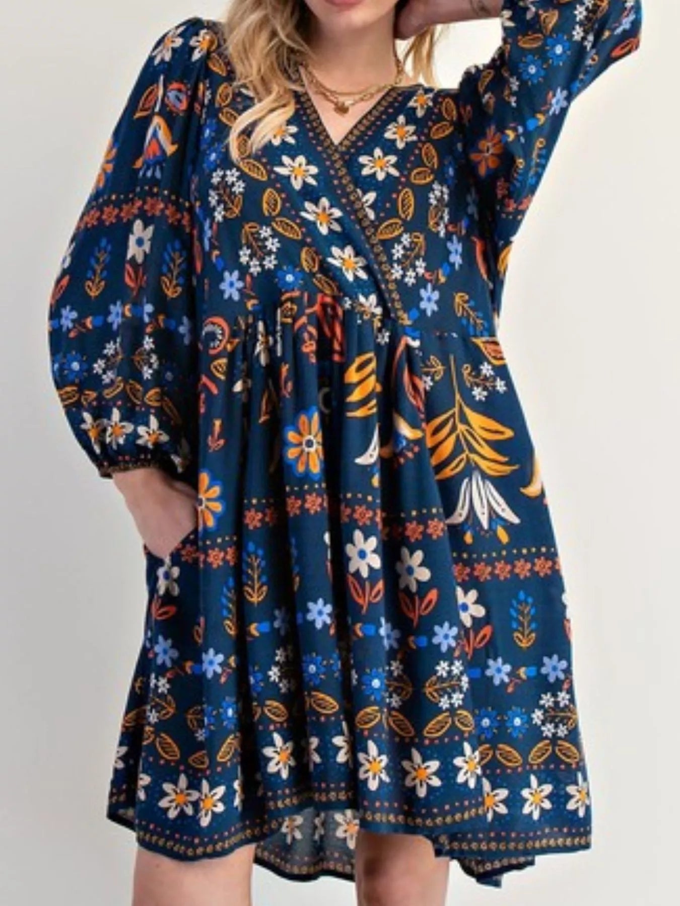 Bohemian floral print long sleeve mini dress in navy blue with puffy sleeves