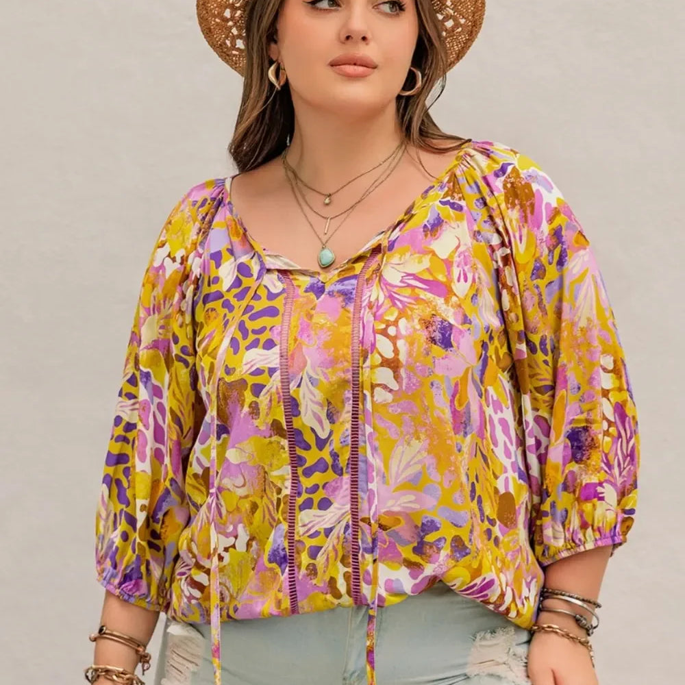 Plus size printed tie neck blouse in yellow purple floral with lace sleeves