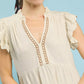 Umgee beige linen tiered babydoll dress with ruffled sleeves and gold embroidery