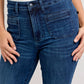 Judy Blue high-waisted flare jeans in dark blue denim, front view