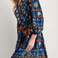Bohemian navy blue floral print long sleeve mini dress with vibrant flowers