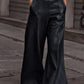 Daverri Fashions black faux leather high waist wide flare pants with silver buckle