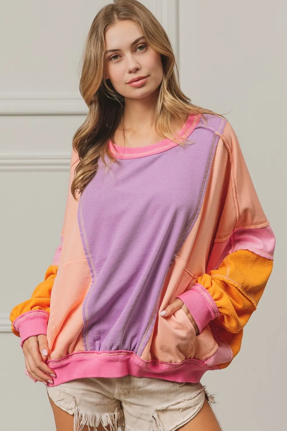 BiBi Color Block Exposed Seam Sweatshirt with Pockets Lavender Peach Fuchsia