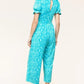 PLUS Spring Vibes Aqua Ikat Print Ruffle Sleeve Wide Leg Jumpsuit - DAVERRI FASHIONS