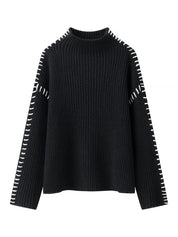 Black ribbed Contrast Mock Neck sweater with white geometric sleeve pattern