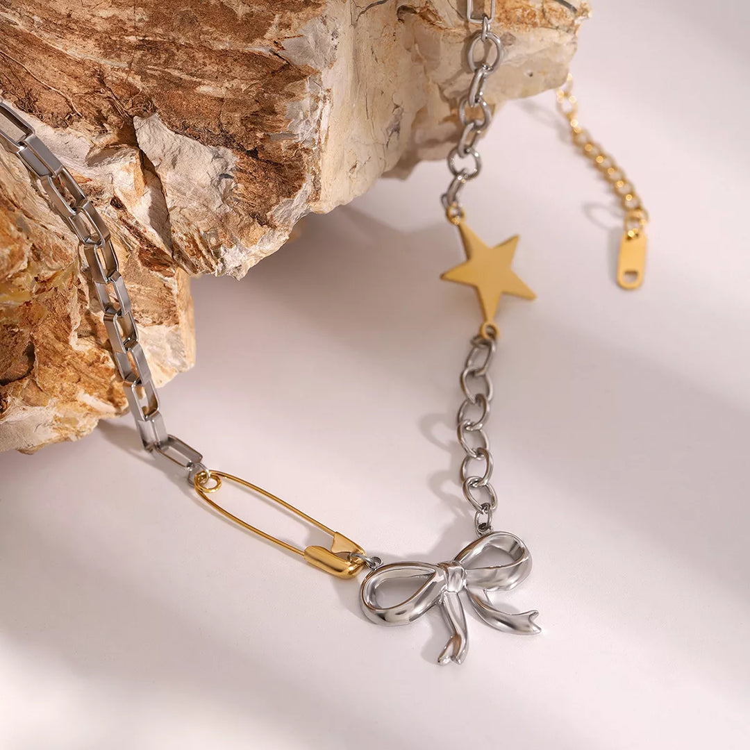 Two-Tone Stainless Steel Bow Star Necklace | Necklaces Daverri Fashions