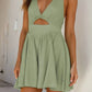 Daverri sage green cutout halter neck mini dress with deep V-neck