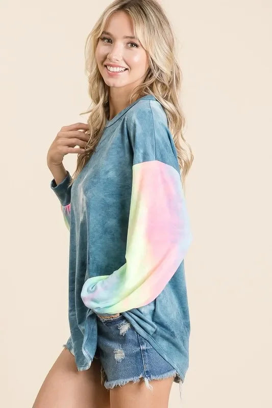 Rainbow tie-dye BiBi French terry long-sleeve top with distressed denim shorts