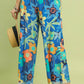 Umgee floral print wide-leg pants in vibrant blue tropical turtle pattern
