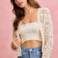 Cream-colored crochet knit long sleeve cardigan with lace pattern