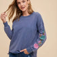 Annie Wear Embroidered Long Sleeve French Terry Top Washed Midnight - DAVERRI FASHIONS