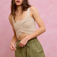 Beige crocheted crop top with thin straps, knot detail on SO ME twill shorts