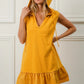 BiBi Ruffled French Terry Hooded Dress in vibrant yellow with ruffled hem