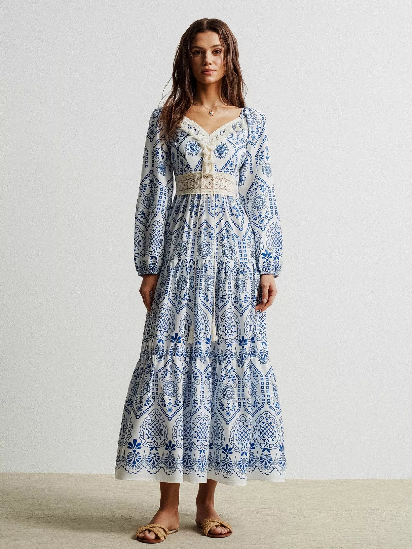 Bohemian blue and white print maxi dress with lace trim and tassel detail